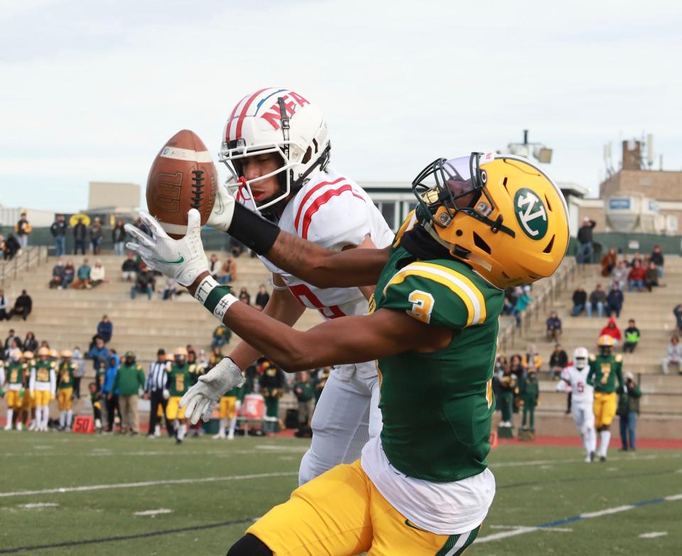 NFA and New London players battle for the ball during the Wildcats' 9-8 win in 2021 at New London's Pat Cannamela Field.