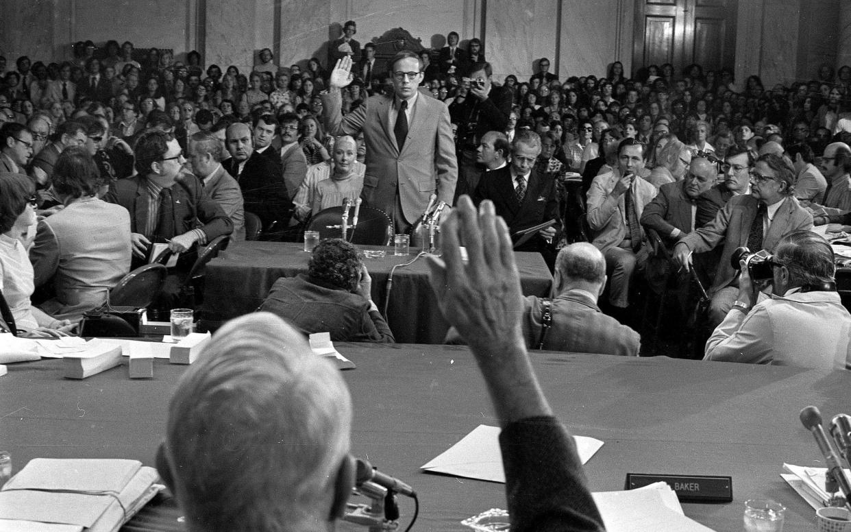 John Dean is sworn in before the Senate Watergate Committee in 1973 - AP