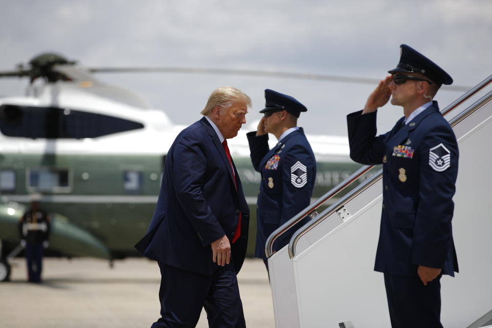 President Donald Trump boards Air Force One at Andrews Air Force Base, Md., Friday, June 5, 2020, en route to Maine to attend a roundtable discussion with commercial fishermen and tour a medical swab manufacturing facility. (AP Photo/Patrick Semansky)