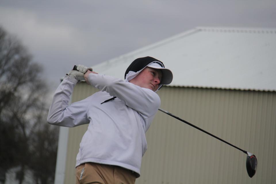 Woodward-Granger's Casey Foster watches his shot after teeing off during an invite on Thursday, April 11, 2024, at Woodward Golf Club.