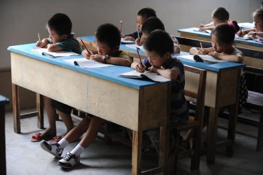 Chinese school children in a classroom in Hefei, east China's Anhui province. China has long been known for its highly disciplined approach to education, but parents and lawmakers alike are beginning to question the wisdom of putting so much pressure on young children