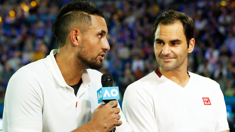 Nick Kyrgios (pictured left) speaks to Roger Federer (pictured right) at the Australian Open.