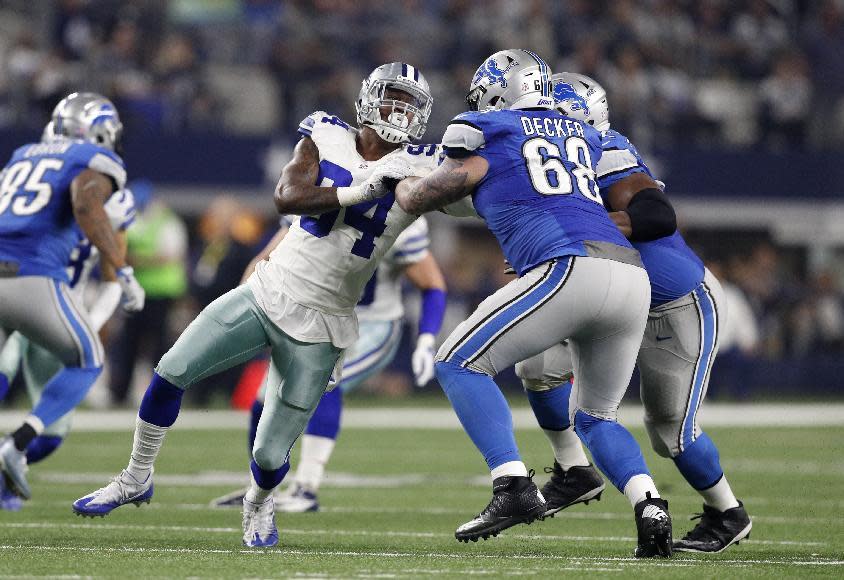 Randy Gregory (middle) has played in 14 games with the Cowboys since he was drafted in 2015. (AP) 