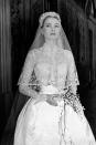 <p>Grace Kelly wore a long-sleeve gown made by costume designer Helen Roser for her wedding to Prince Rainier II of Monaco.</p>