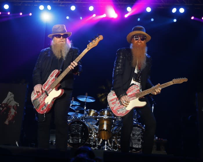 INDIO, CA APRIL 25, 2015: ZZ Top bassist Dusty Hil, left, and guitarist Billy Gibbons perform on the Palomino Stage on the second day of the three-day Stagecoach Country Music Festival at the Empire Polo Club in Indio Saturday, April 25, 2015. Carroll said their mission is to bring a piece of American depression-era history to America. Stagecoach is the highest grossing and biggest-attendance country music festival, Pollstar reports. (Allen J. Schaben / Los Angeles Times)