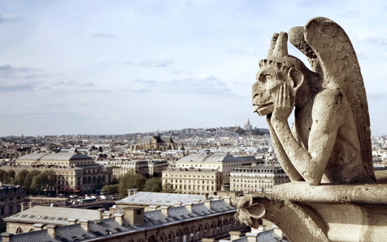 View from the Notre Dame in Paris, with the Sacre Coeur just in the distance - E+