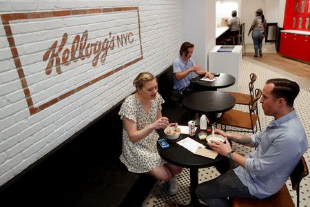 Guests eat cereal at the Kellogg's NYC cafe in Midtown Manhattan in New York City, U.S., June 29, 2016. REUTERS/Brendan McDermid