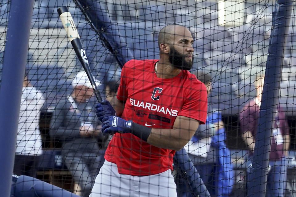 Cleveland Guardians' Amed Rosario bats during a workout ahead of Game 1 of baseball's American League Division Series against the New York Yankees, Monday, Oct. 10, 2022, in New York. (AP Photo/John Minchillo)