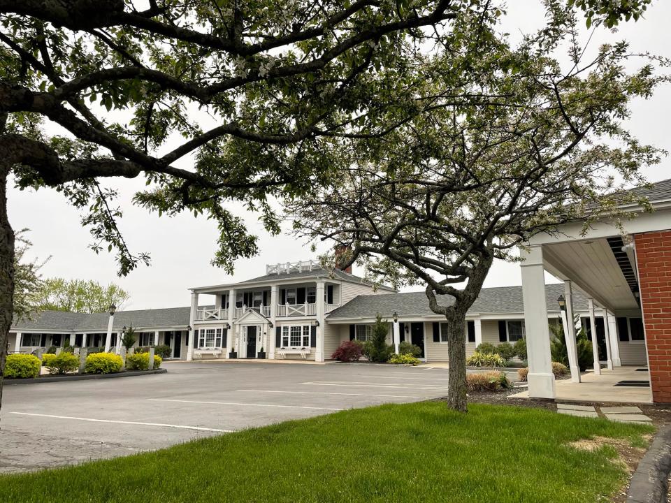 Developers have withdrawn their application seeking to demolish the existing Port Inn off the route 1 Bypass and replace it with a five-sotry hotel and Starbucks, featuring a drive-thru window