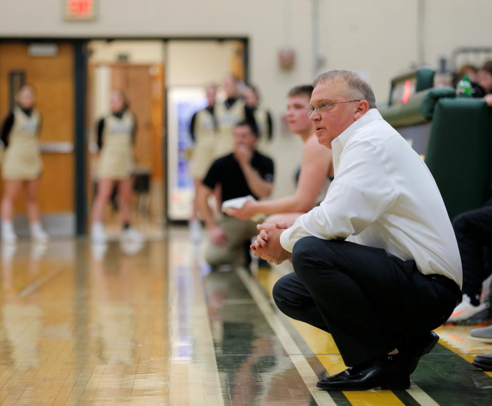 Northeastern head coach Brent Ross watches his team from the sideline during a game against Winchester Feb. 17, 2023.