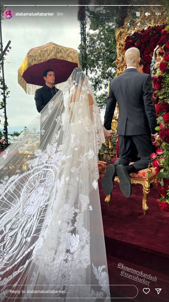 Kourtney Kardashian Wears White with Travis Barker's Daughter Alabama in First Photo from Wedding. https://www.instagram.com/alabamaluellabarker/.
