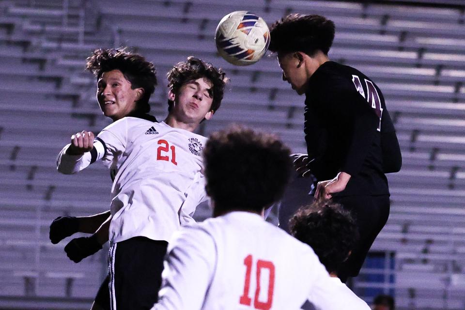 Weston Ranch defender Abraham Palacios and Lincoln Midfielder Bailey Ponte rise up to battle for corner kick during at Weston Ranch High in Stockton, CA