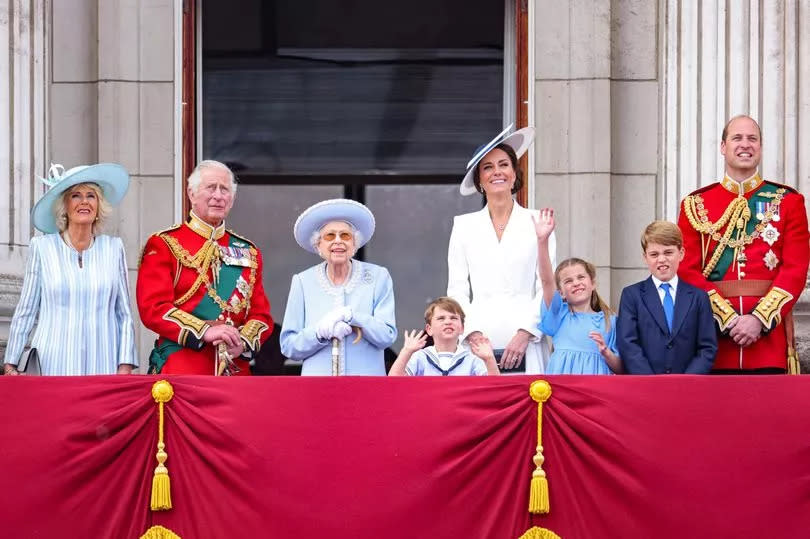 Camilla, Duchess of Cornwall, Prince Charles, Prince of Wales, Queen Elizabeth II, Prince Louis of Cambridge, Catherine, Duchess of Cambridge, Princess Charlotte of Cambridge, Prince George of Cambridge and Prince William, Duke of Cambridge on the balcony of Buckingham Palace watch the RAF flypast during the Trooping the Colour parade on June 02, 2022