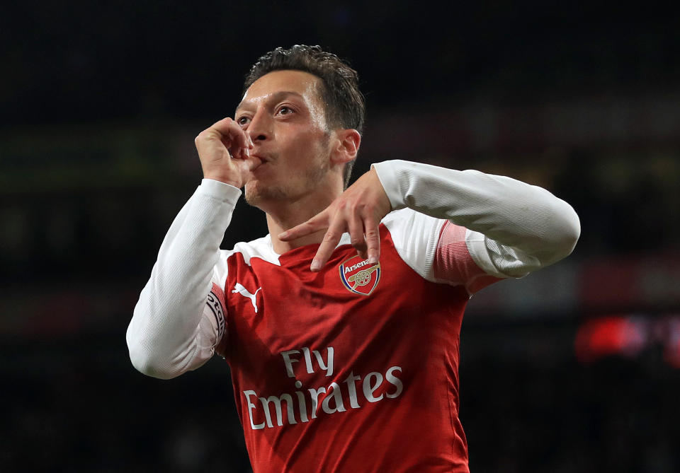 Mesut Ozil has been pictured apparently inhaling nitrous oxide (Mike Egerton/PA)