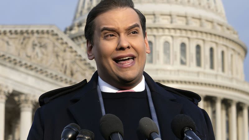 Then-Rep. George Santos, R-N.Y., faces reporters at the Capitol in Washington, Nov. 30, 2023. The former lawmaker has been making ends meet by making Cameo messages, but is now in a dispute with entertainer Jimmy Kimmel.