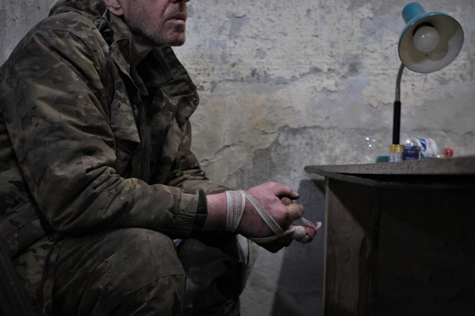 A member of the Russian paramilitary group Wagner and former criminal prisoner sits in the interrogation room after being captured by Ukrainian soldiers near Bakhmut on March 12, 2023.