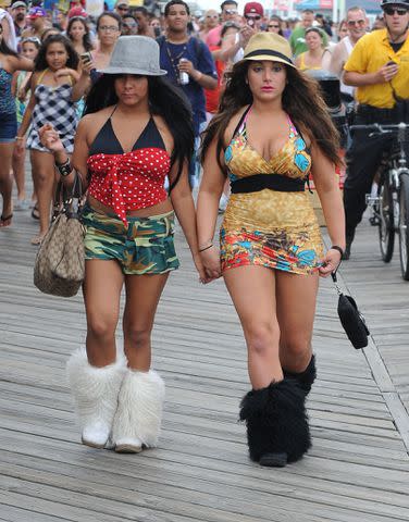 <p>SplashNews</p> Snooki and Deena Cortese in 2011