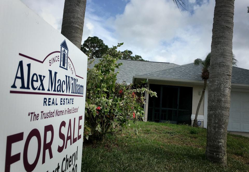 Home sales are still continuing, shown by "FOR SALE" signs in front of a property in the Vero Highlands.