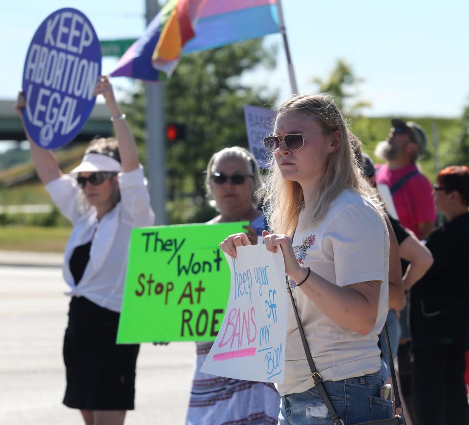 Tabitha Beadnell, right, lets her opinion be known during a protest in Plain Township after the U.S. Supreme Court overturned Roe v. Wade on Friday.