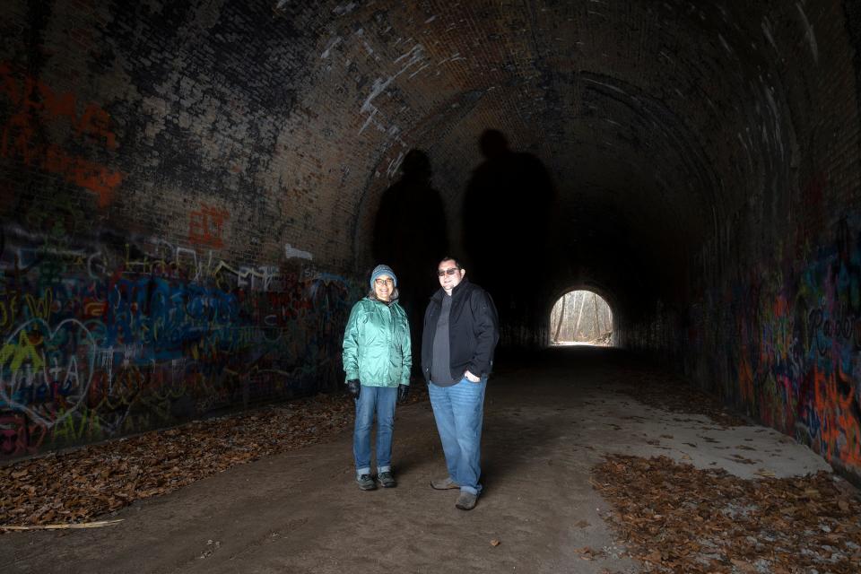 Mary Jane Kelley, president of the Moonville Rail Trail Association and Caleb Appleman, rail trail association secretary and Vinton County marketing director, are dedicated to educating people about and preserving the trail's history, which sometimes means talking about its spookier legends.