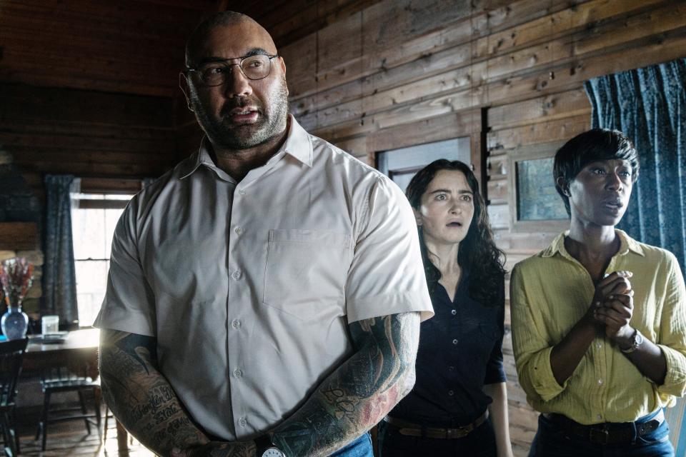 Dave Bautista, Abby Quinn and Nikki Amuka-Bird in Knock at the Cabin