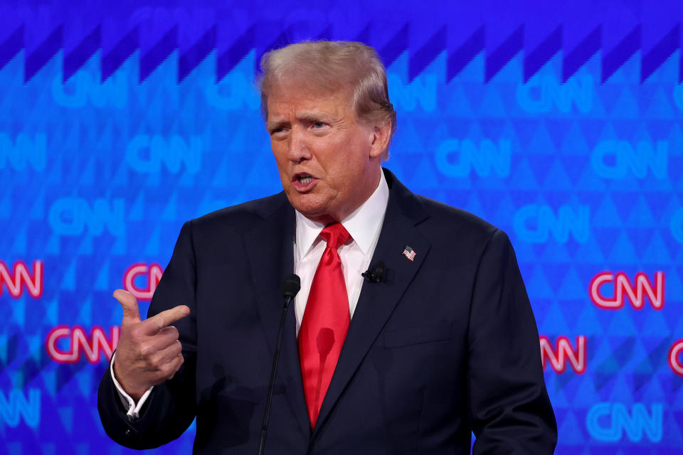 Former President Donald Trump gestures during the debate in Atlanta