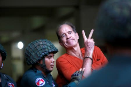 Australian filmmaker James Ricketson gestures as he leaves the Municipal Court of Phnom Penh, Cambodia August 16, 2018. REUTERS/Samrang Pring