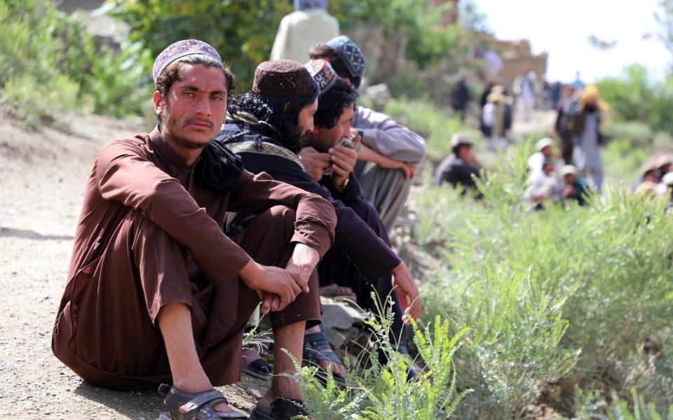 Afghans receive humanitarian aid after powerful earthquake hit eastern Afghanistan before dawn on 22 June, in Paktika, Afghanistan - Sayed Khodaiberdi Sadat/Anadolu Agency via Getty Images