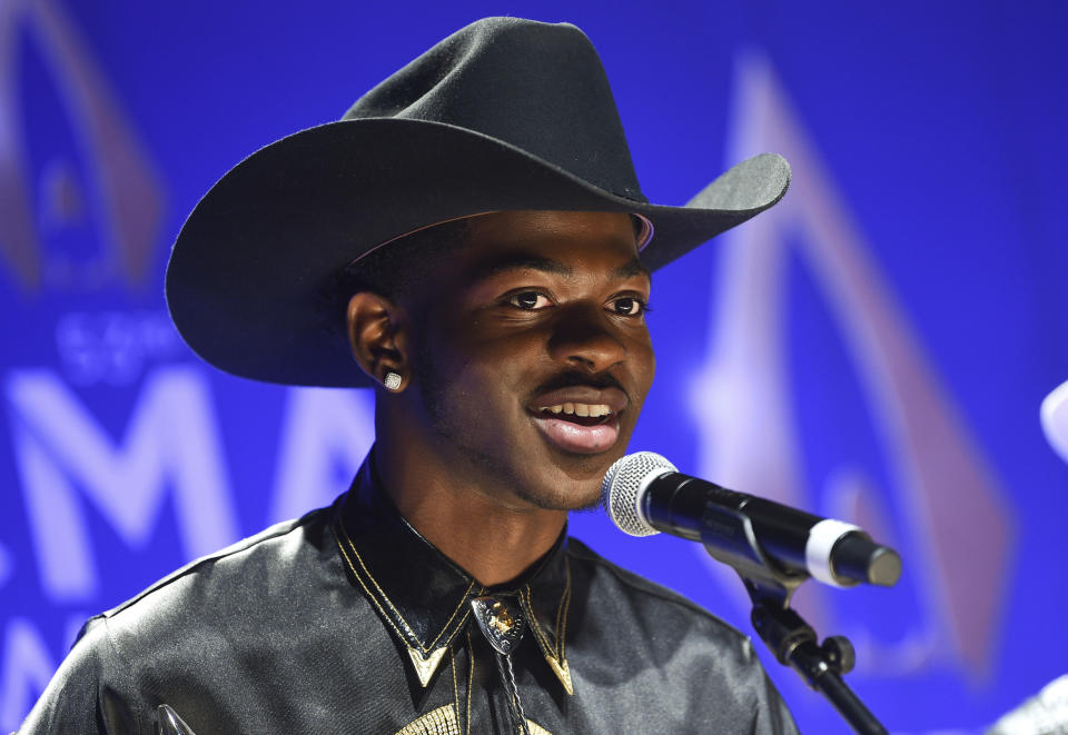 FILE - This Nov. 13, 2019 file photo shows rapper Lil Nas X after winning the musical event of the year award at the 53rd annual CMA Awards in Nashville, Tenn. Genre-mashing, bold and chart-topping new artists have caught the attention of the Recording Academy, as Lizzo, Billie Eilish and Lil Nas X lead in nominations at the 2020 Grammy Awards. (Photo by Evan Agostini/Invision/AP, File)