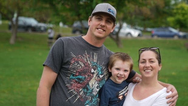 The Meek family from left, Jordan, Liam and Katherine have experienced child-care challenges on both sides of the Ontario-Quebec border and are glad the issues are getting 'overdue' national attention. (Matthew Kupfer/CBC - image credit)