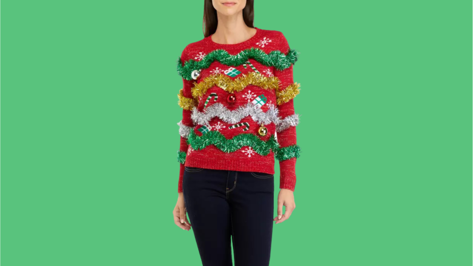 Add some texture and sparkle to your Ugly Christmas Sweater party with this tinsel-covered option.