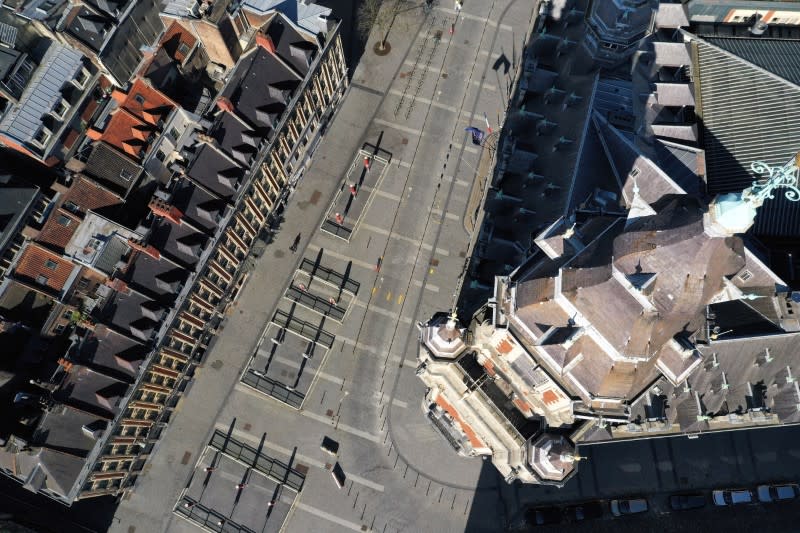 An aerial view of the deserted Theater square and beffroy, during a lockdown imposed to slow the spread of the coronavirus disease (COVID-19), in Lille