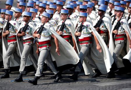 Soldiers of French 1st Spahis Regiment march in the traditional Bastille Day military parade on the Champs-Elysees Avenue in Paris, France, July 14, 2018. REUTERS/Charles Platiau