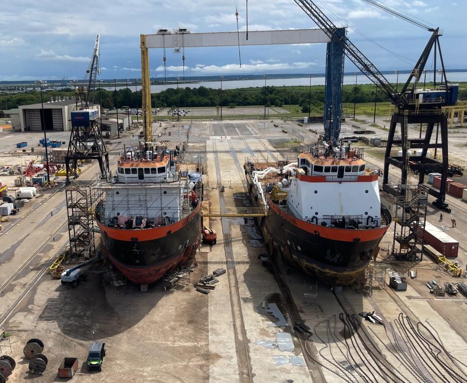 The MV Barnstable, left, and MV Aquinnah, right, sit in a dry dock in an Alabama shipyard. The two vessels are set to be refloated March 29 and be ready for service in early summer.