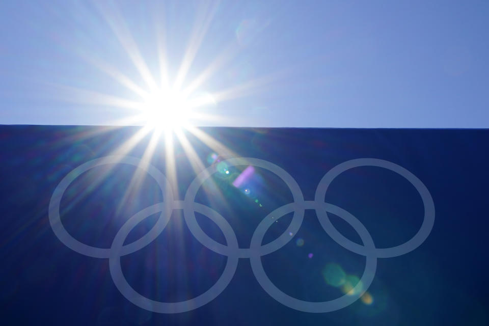 FILE - In this July 21, 2021, file photo, the Olympic rings are seen at Yokohama Baseball Stadium as the field is prepared for softball competition at the 2020 Summer Olympics in Yokohama, Japan. From doping, to demonstrations to dirty officials, the Olympics have never lacked their share of off-the-field scandals and controversies that keep the Games in the headlines long after the torch goes out. (AP Photo/Matt Slocum, File)