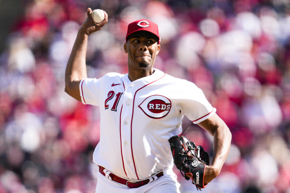 Cincinnati Reds starting pitcher Hunter Greene (21) throws against the Pittsburgh Pirates in the second inning of an opening day baseball game in Cincinnati, Thursday, March 30, 2023. (AP Photo/Jeff Dean)