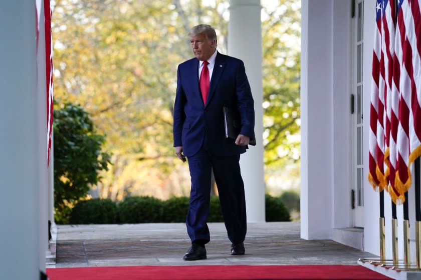 President Donald Trump arrives to speak in the Rose Garden of the White House, Friday, Nov. 13, 2020, in Washington. (AP Photo/Evan Vucci)