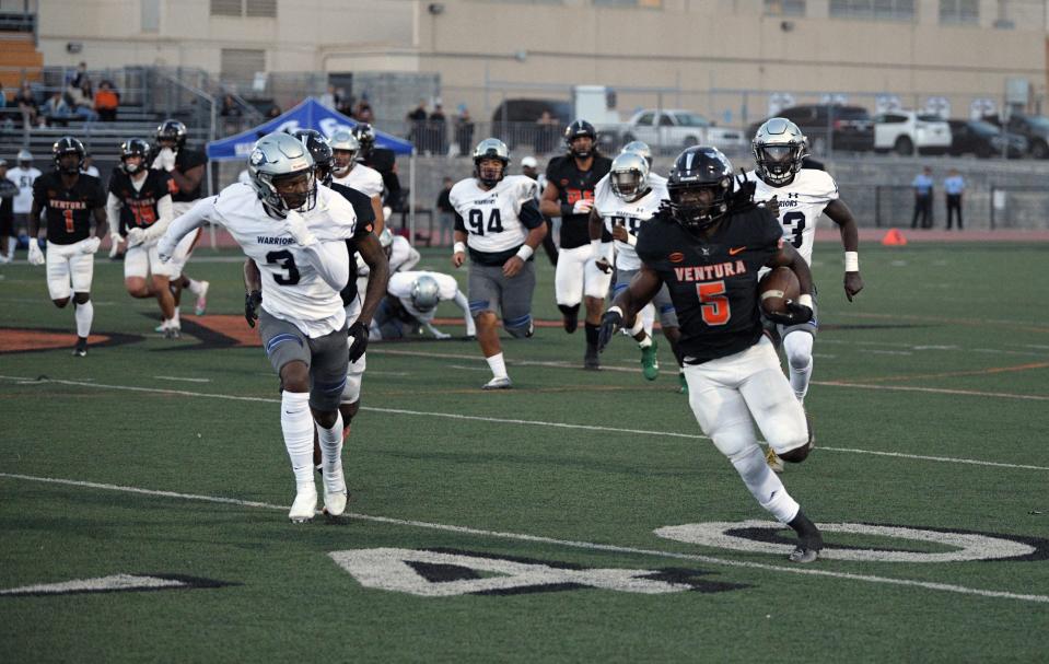 Ventura College running back JQ Brown runs to daylight in the Pirates' win over visiting El Camino College Saturday at the VC Sportplex.