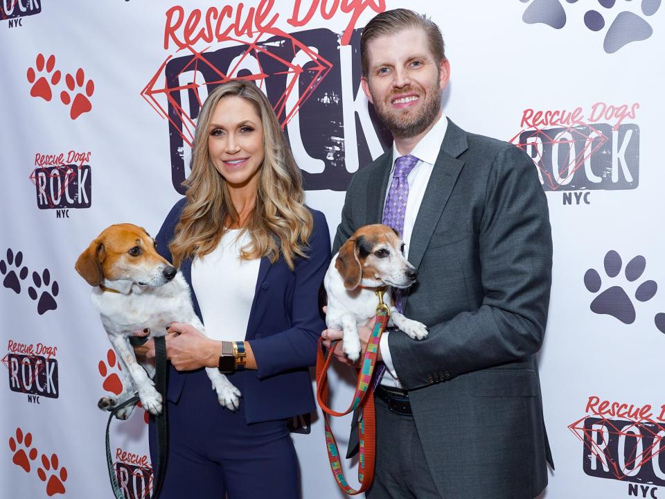 Eric and Lara Trump with their dogs