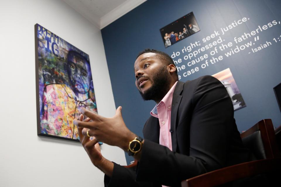 In this photo taken Wednesday Aug. 14, 2019, Stockton Mayor Michael Tubbs discusses a program he initiated to give $500 to 125 people who earn at or below the city's median household income of $46,033 during an interview in Stockton, Calif.