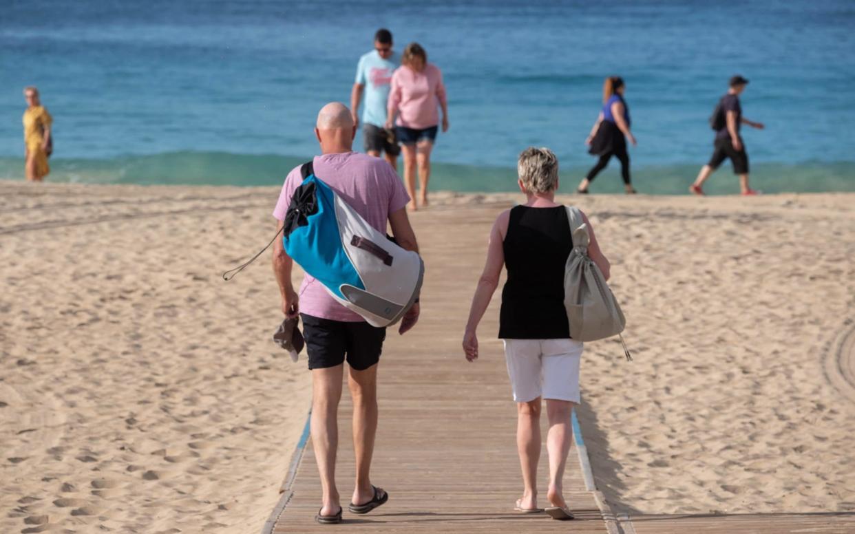 Morro Jable beach on Fuerteventura earlier this month. Millions of Britons are at risk of missing their summer holiday - EPA