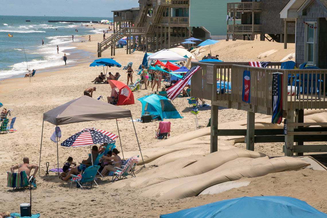 The beach front between the Cape Hatteras Motel and the Outer Bank Motel on photographed on June 30, 2021 in Frisco, N.C. Robert Willett/rwillett@newsobserver.com