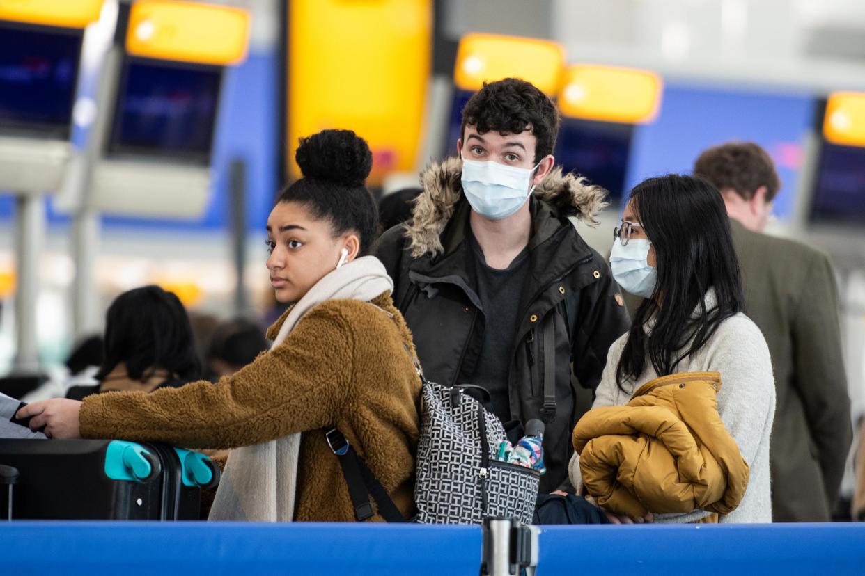 Passengers at Heathrow Airport, London, in March 2020 (Photo by Leon Neal/Getty Images): (Photo by Leon Neal/Getty Images)