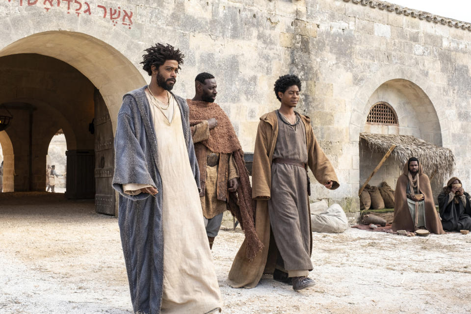 This image released by Sony Pictures shows LaKeith Stanfield, from left, Omar Sy and R.J. Cyler in a scene from "The Book of Clarence." (Moris Puccio/Legendary Entertainment/Sony via AP)