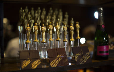 Oscar shaped chocolates are pictured at a preview of the food and decor for the 87th Academy Awards' Governors Ball at the Ray Dolby ballroom in Hollywood, California February 4, 2015. REUTERS/Mario Anzuoni