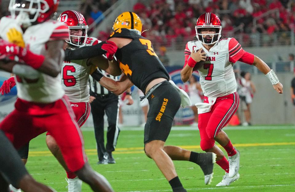 September 24, 2022; Tempe, Arizona; USA; Utah quarterback Cameron Rising (7) runs against ASU during a game at Sun Devil Stadium.