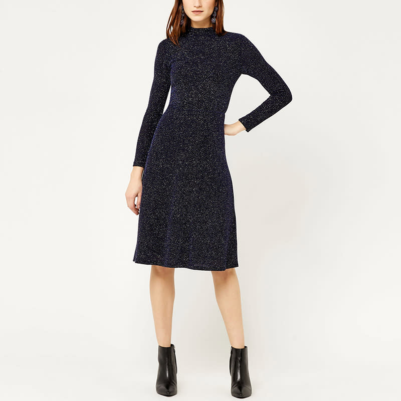 <p>Want sparkle but don't want to go dramatic? This mock-neck, long-sleeved dress is both modest and glitzy.</p> <p><a rel="nofollow noopener" href="http://www.warehouse-london.com/us/clothing/dresses/crystal-glitter-midi-dress/030524.html?dwvar_030524_color=36&position=47&cgid=dresses" target="_blank" data-ylk="slk:Warehouse Crystal Glitter Midi Dress;elm:context_link;itc:0;sec:content-canvas" class="link ">Warehouse Crystal Glitter Midi Dress</a>, $93</p>