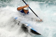 <p>Xin Quan of China competes during the July 30 men's kayak slalom semifinal.</p>