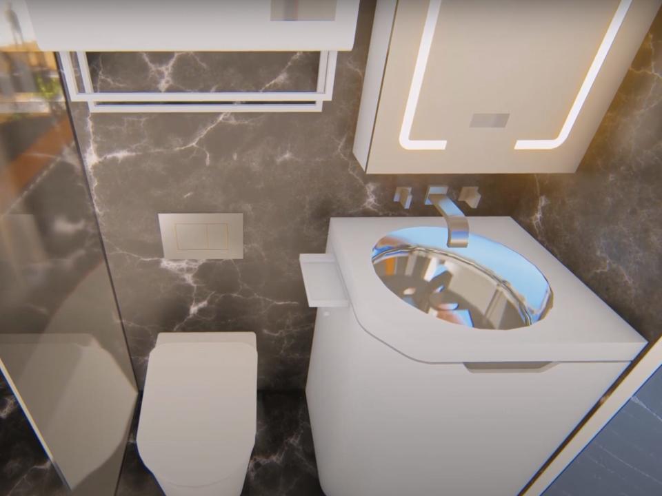 a rendering of the interior of the Cube Two X's bathroom with a sink, heated towel rack, shower, and toilet