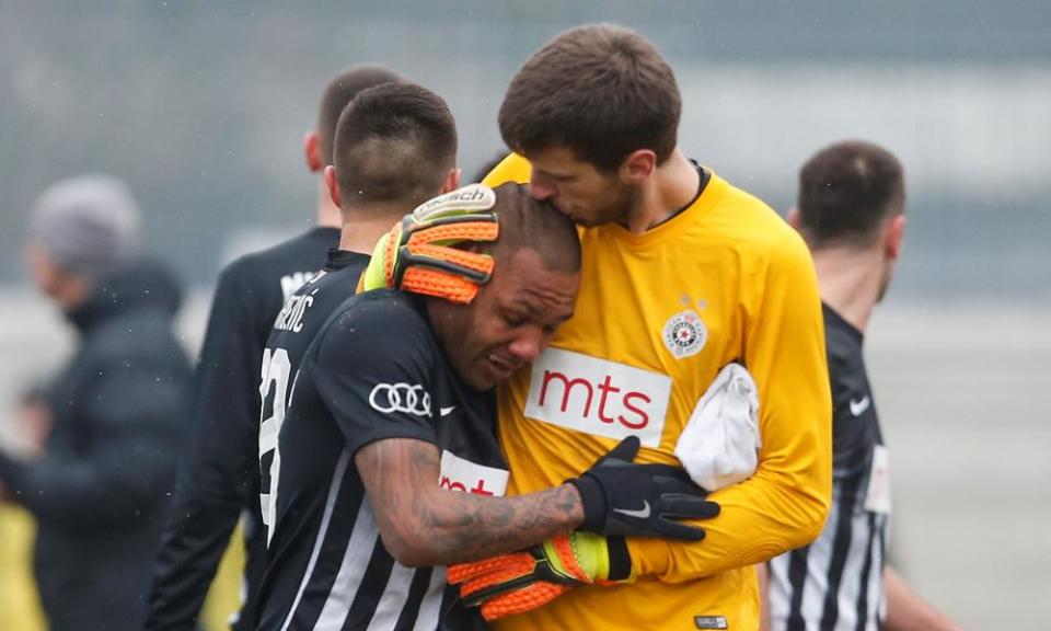 A tearful Everton Luiz is comforted by his Partizan Belgrade team-mate Filip Kljajic as he left the pitch in tears at the racist abuse he suffered in the derby against FK Rad. 